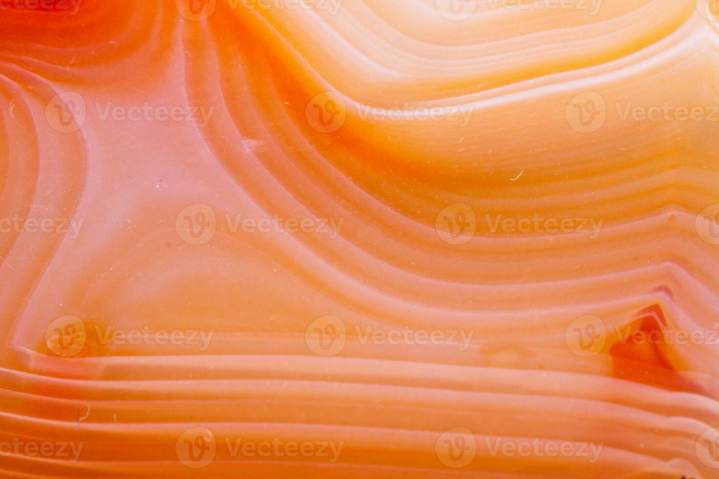 Macro mineral orange agate in crystals on white background photo