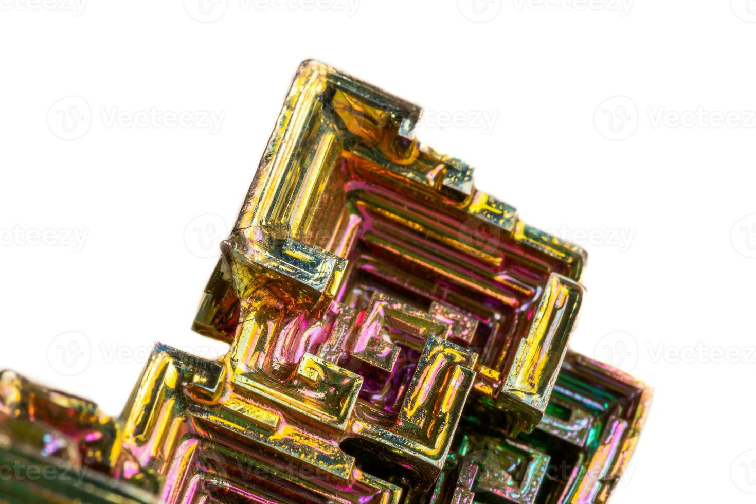 Macro of the mineral bismuth stone on a white background photo