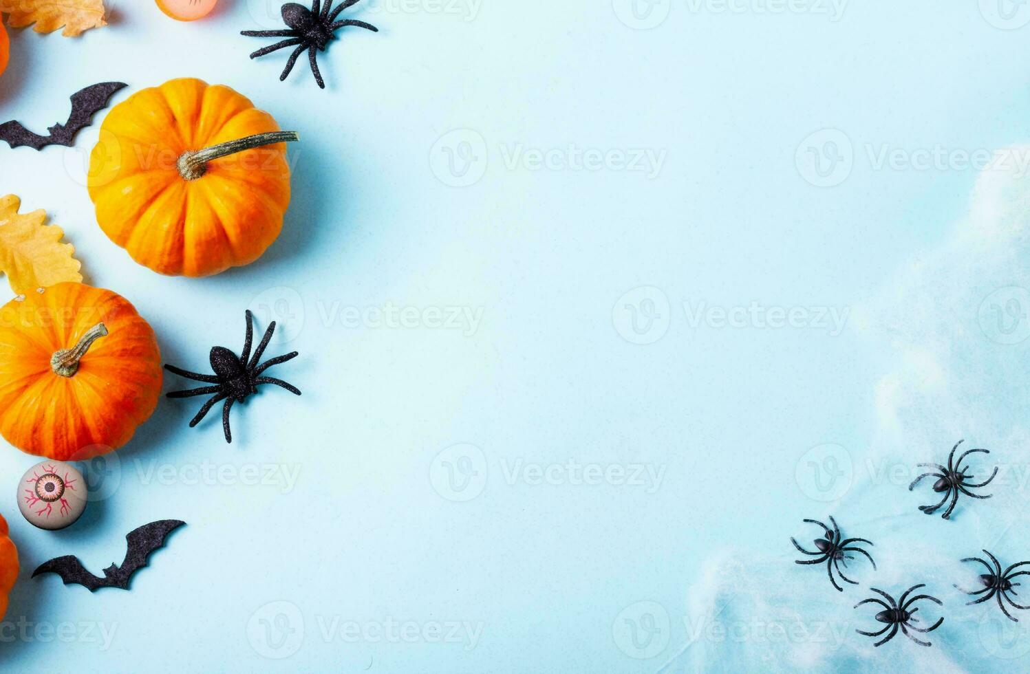 Happy Halloween banner or party invitation background with clouds bats and pumpkins photos