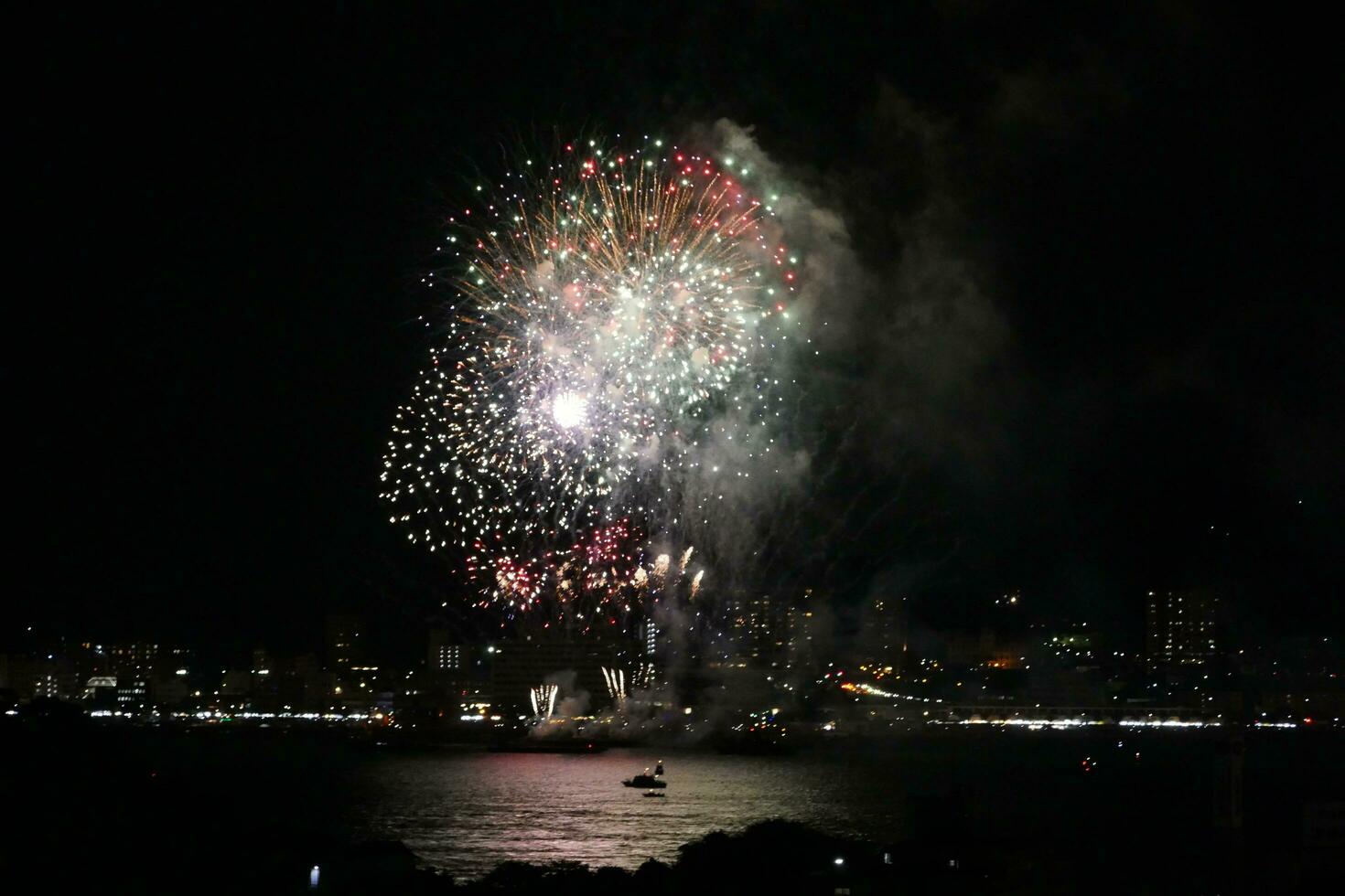 fireworks over the water photo