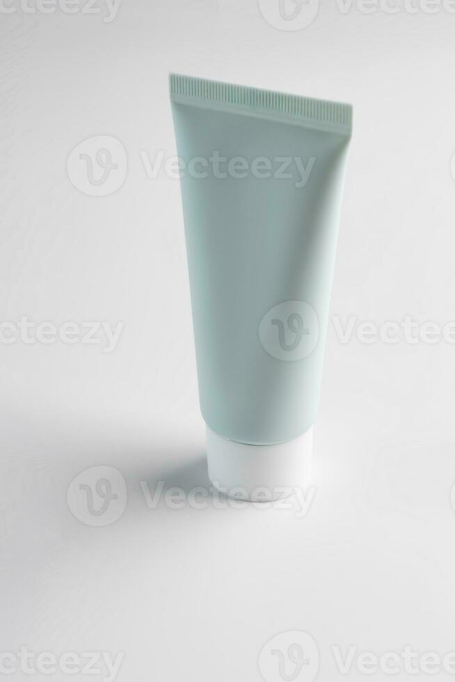 beauty skincare cosmetic mockup cream or lotion in tube pakage on white background, sunscreen protection on white background photo