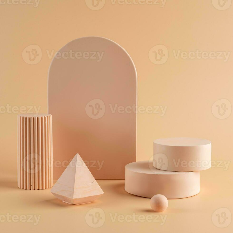Blank beige podium platforms or pedestals with beige background for product display. Empty stands for showing or presenting products. photo