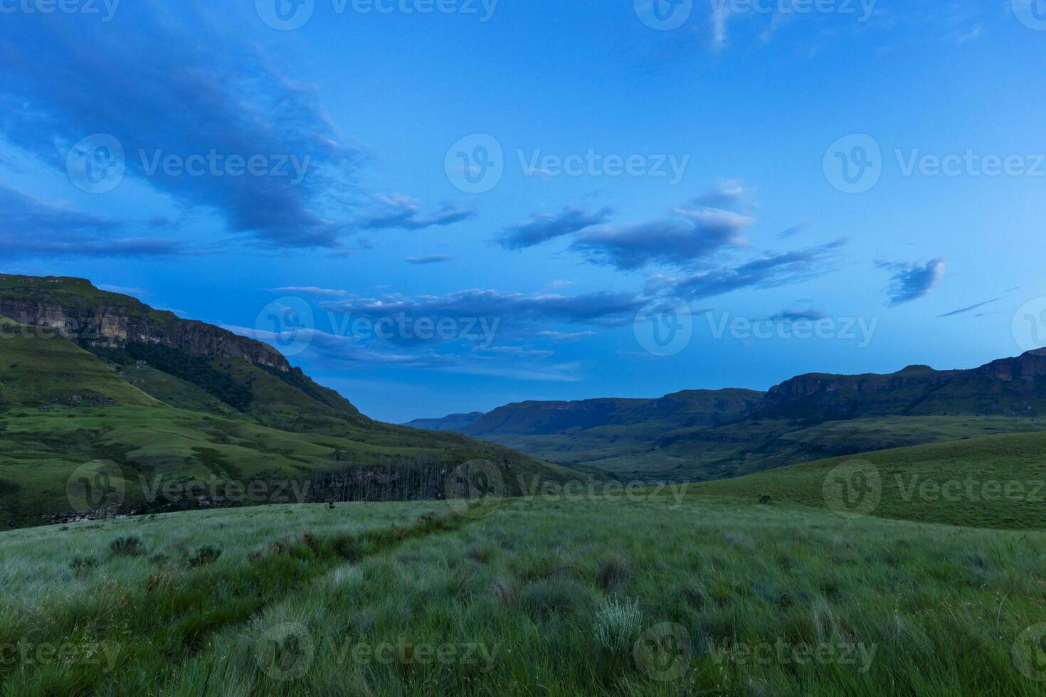 Blue hour after sunset in the mountains photo