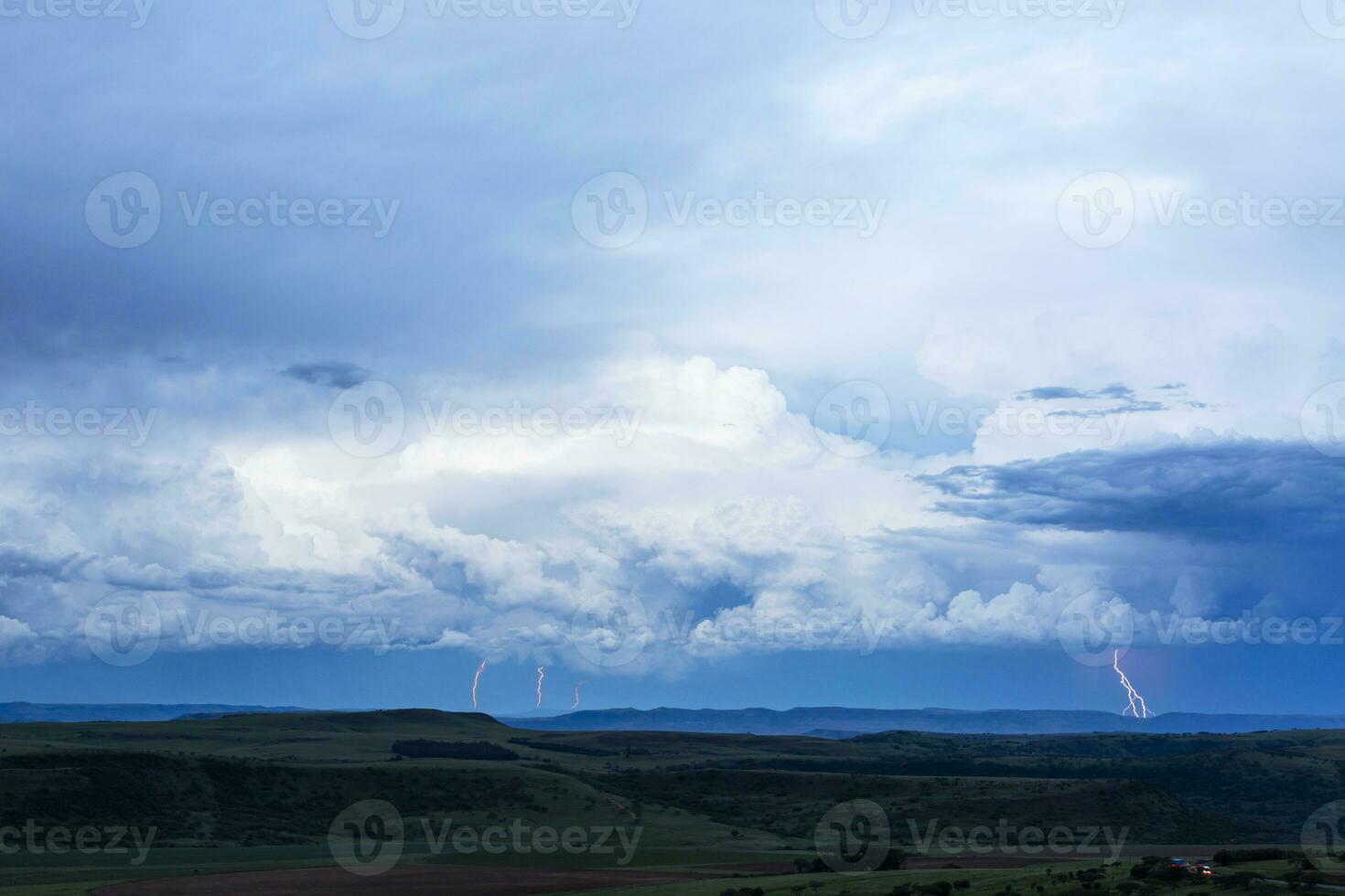 Lightning from clouds to ground photo