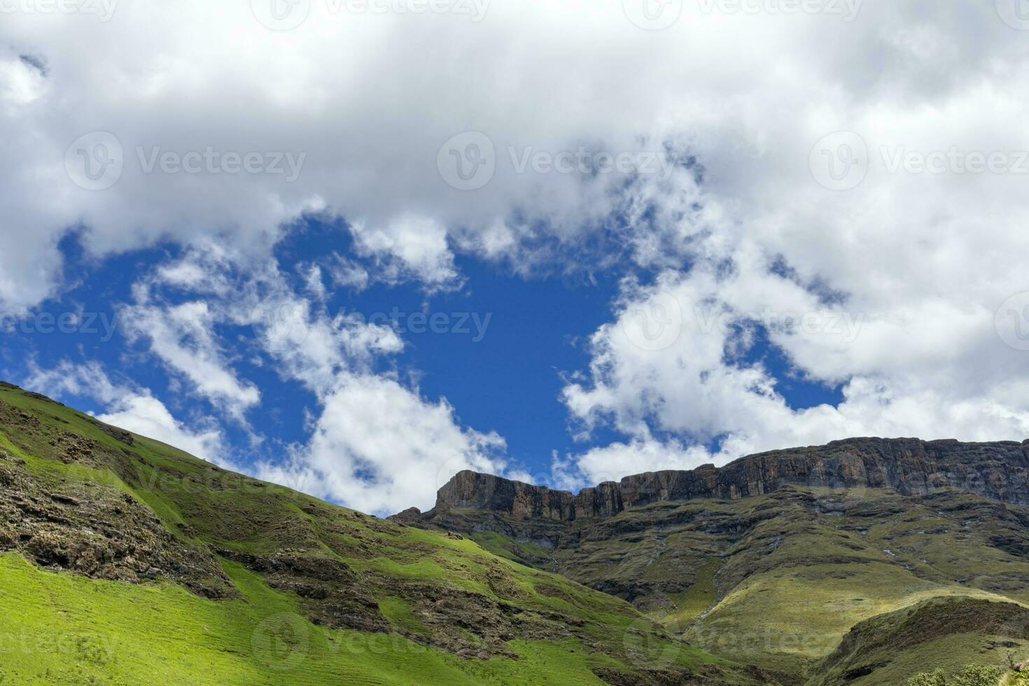 Clouds gather above Drakensberg mountains photo