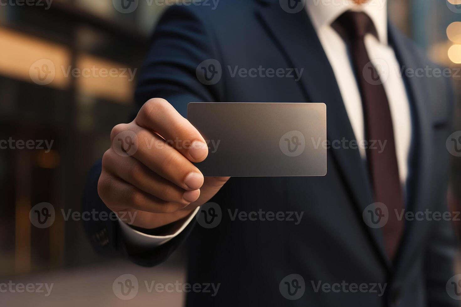Businessman Wearing Suit Showing Business Card as Identification and Personal Identity photo