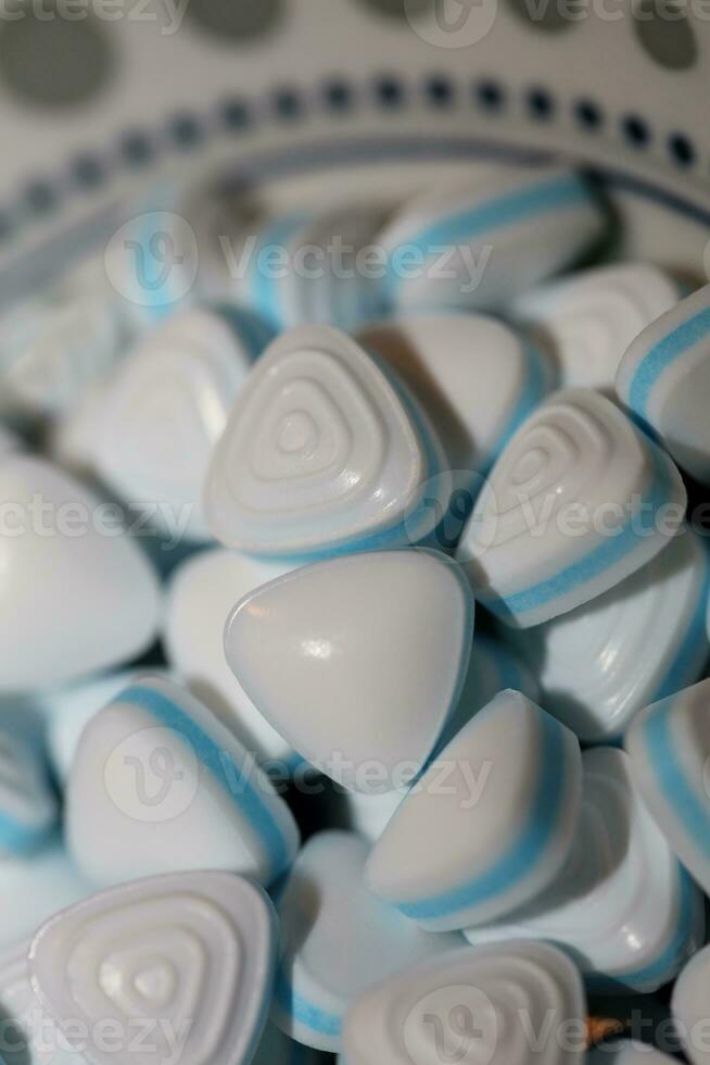 Group of sweet colorful candy light blue triangle refreshment caramel bubble gum macro view background modern high quality big size instant stock photography prints photo