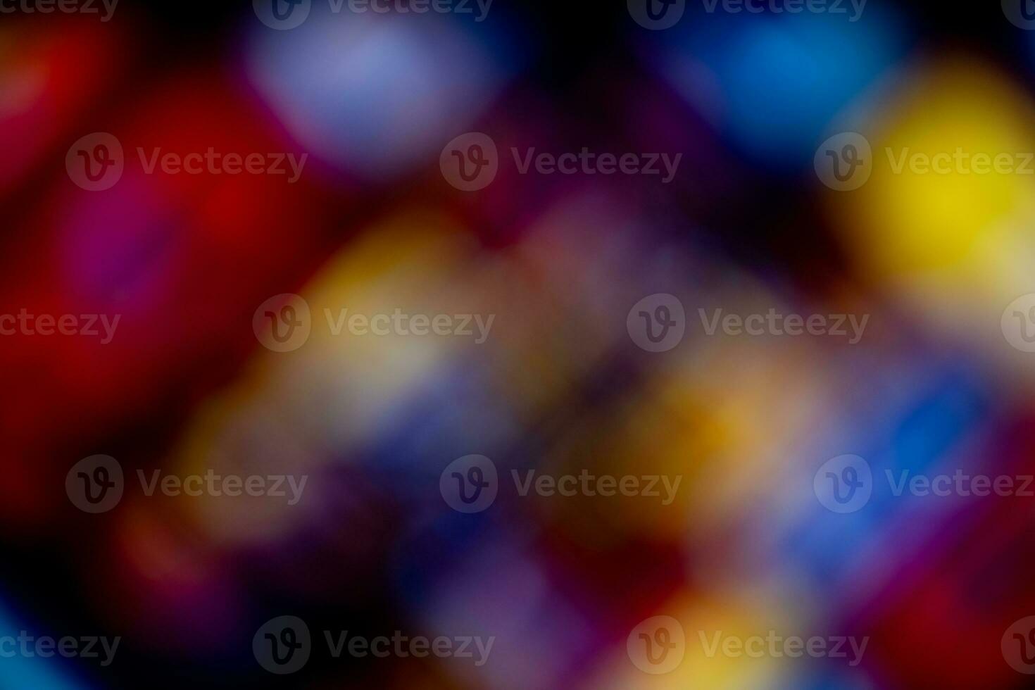 Bokeh captured by computer monitors and light bulbs Make a blurred image for various festivals and use it as a background image at a party. photo