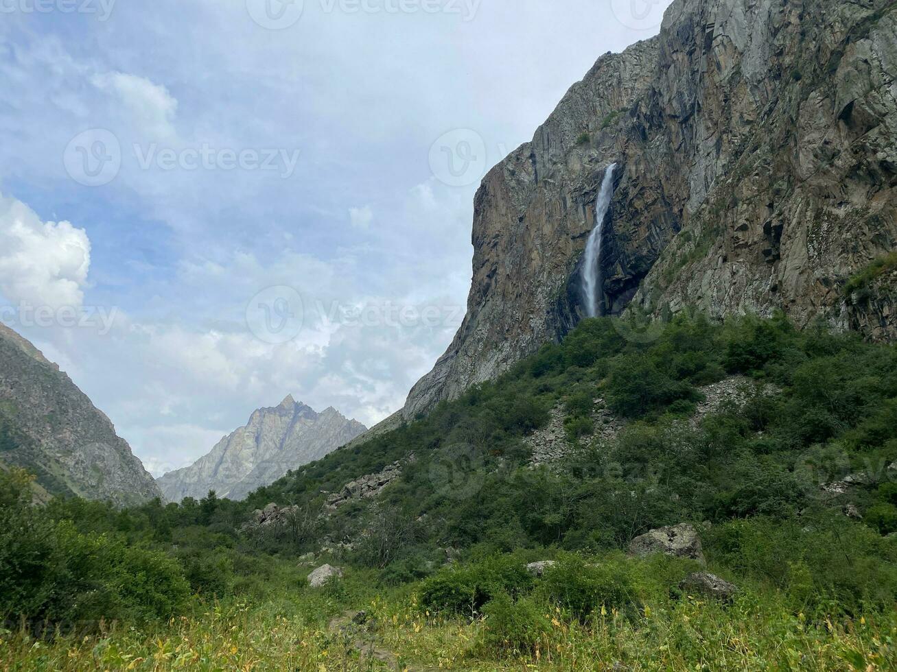 Mountains of Kyrgyzstan. Trekking in the mountains of Kyrgyzstan. Belogorsk Gorge. Beautiful view of the mountains. Waterfall in the mountains. Central Asia, Kyrgyzstan. photo