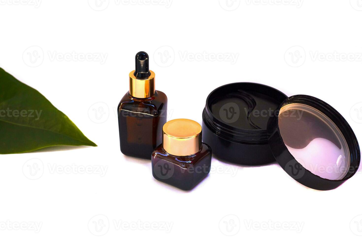 Under the eyes, dark circles, hydrogel patches on a white background.Eye Patches. Hydrogel moisturizing and rejuvenating patches for the skin around the eyes. Mask to relieve swelling under the eyes photo