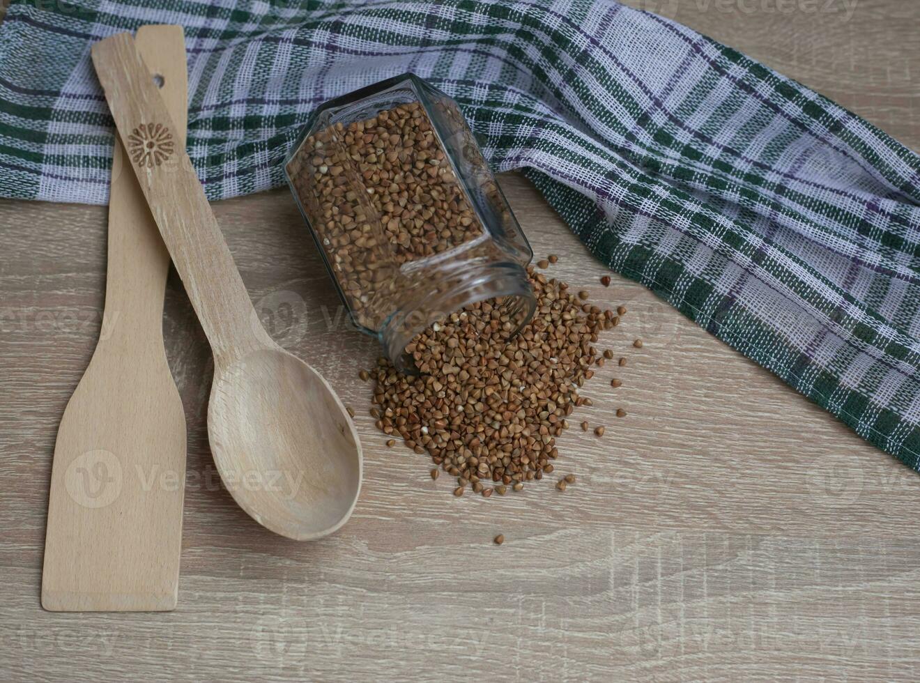 Bowl of tasty buckwheat porridge on table, top view photo