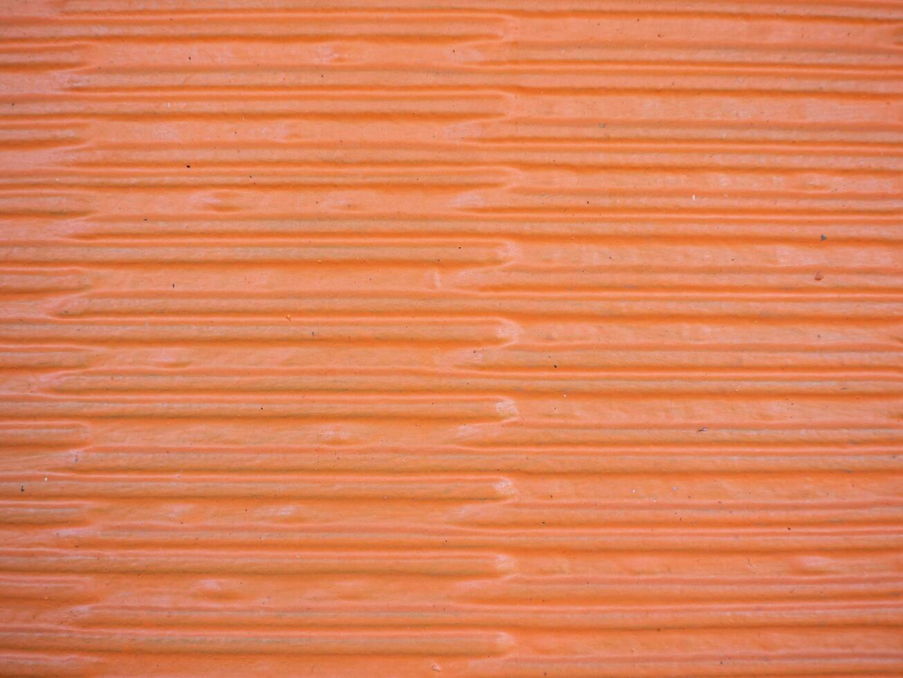 striped orange wall cement motif for background with copy space photo