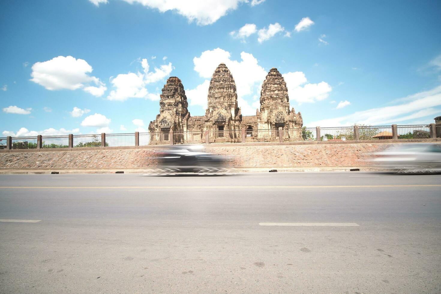 Long exposure of the vehicle in front of the architecture, Thailand. photo