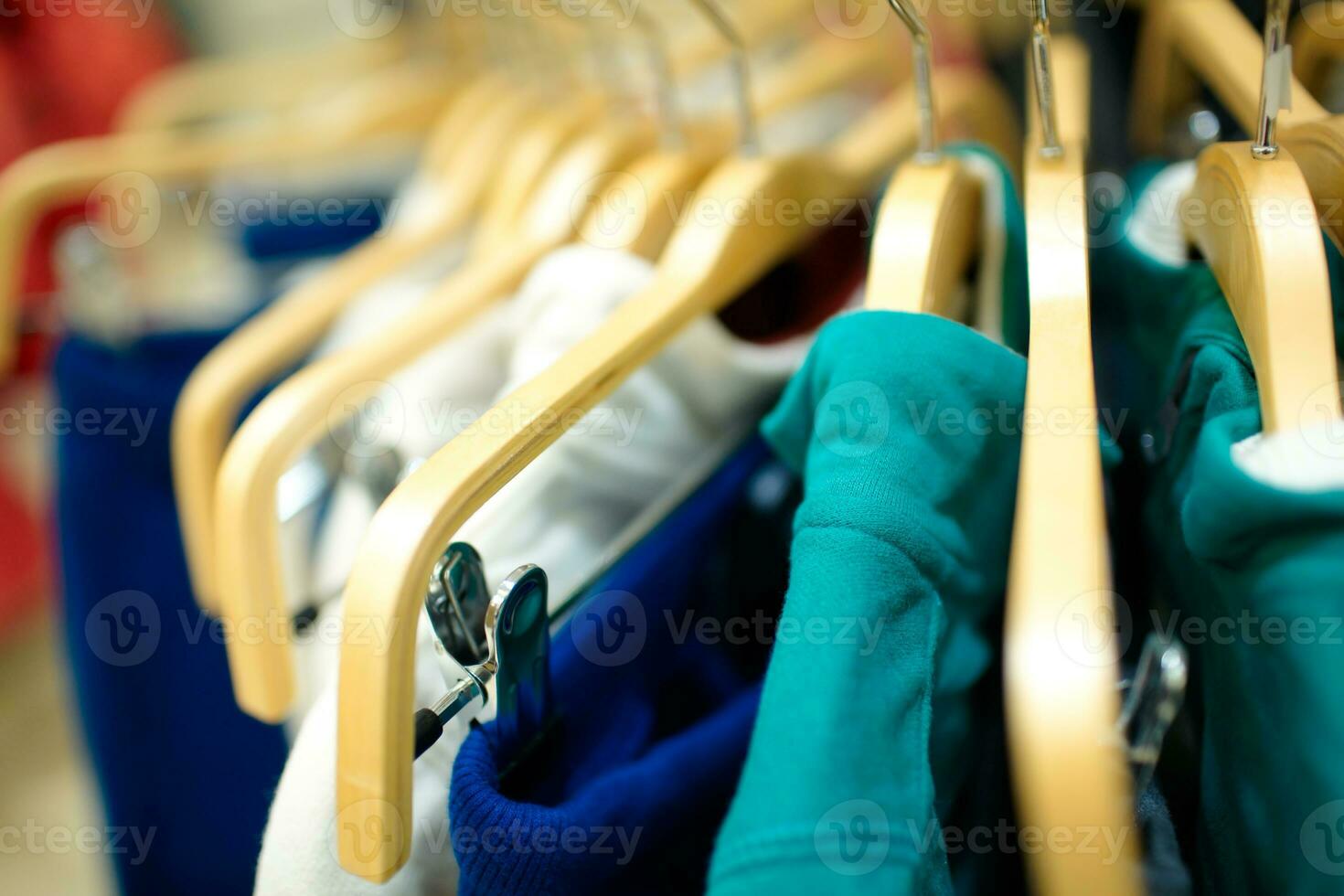 Hangers in the clothing store. photo