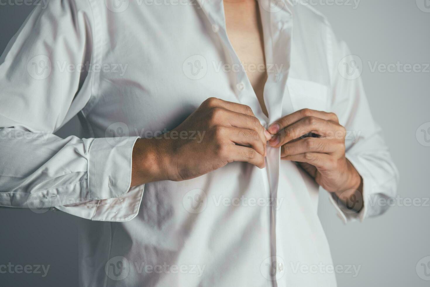 Closed up of businessman getting dressed isolate on white background. working concept. photo