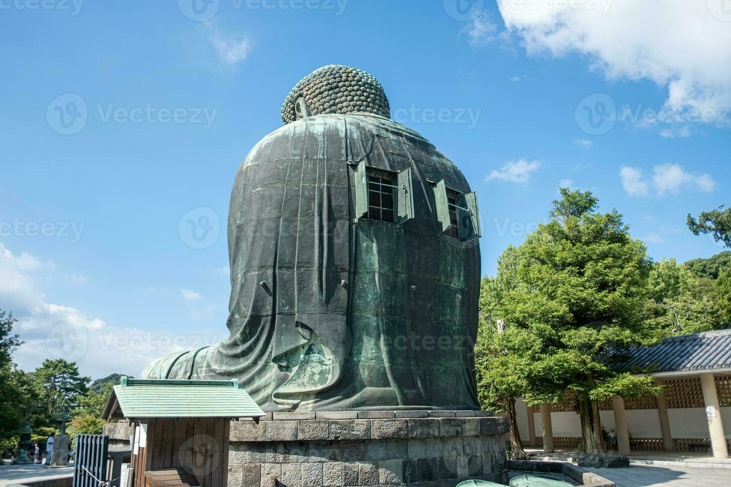 The great blue buddha statue Kamakura Daibutsu at Kotoku in shrine temple in Kamakura,Kanagawa, Japan photo