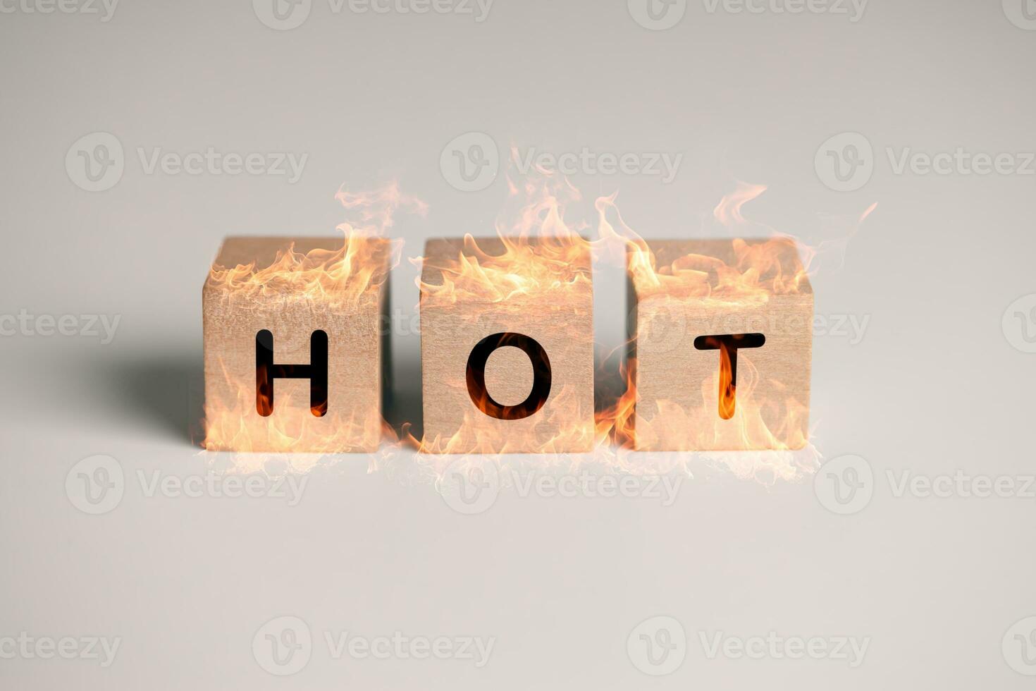 wooden cube block with text HOT and fire. temperature, weather and environment concept. photo