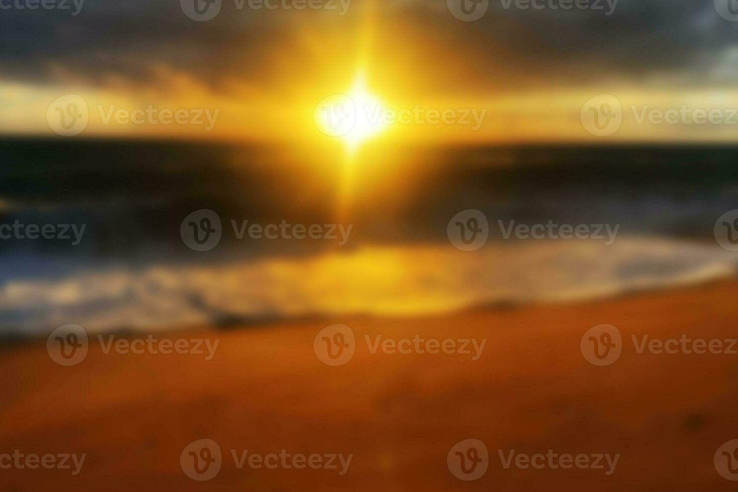 Blur tropical sunset beach with bokeh sun light wave abstract background. photo