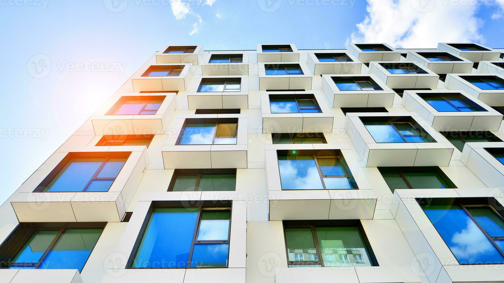 The facade of the new apartment building shaped like cubes. Minimalist  apartment building of a cube structure. photo