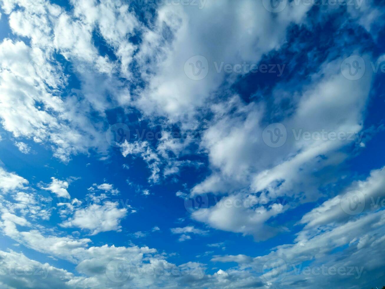 Blue sky and beautiful soft white clouds good weather for background photo