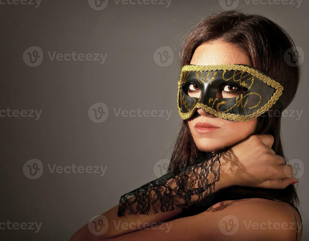 Beautiful female wearing mask photo