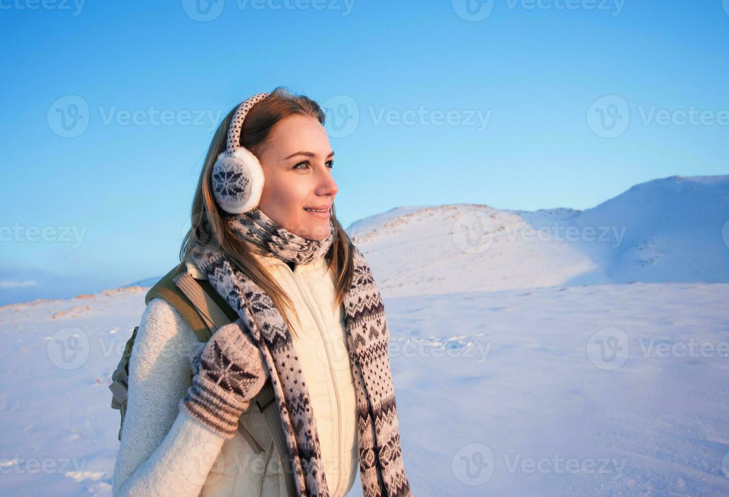 Happy female on winter holidays photo