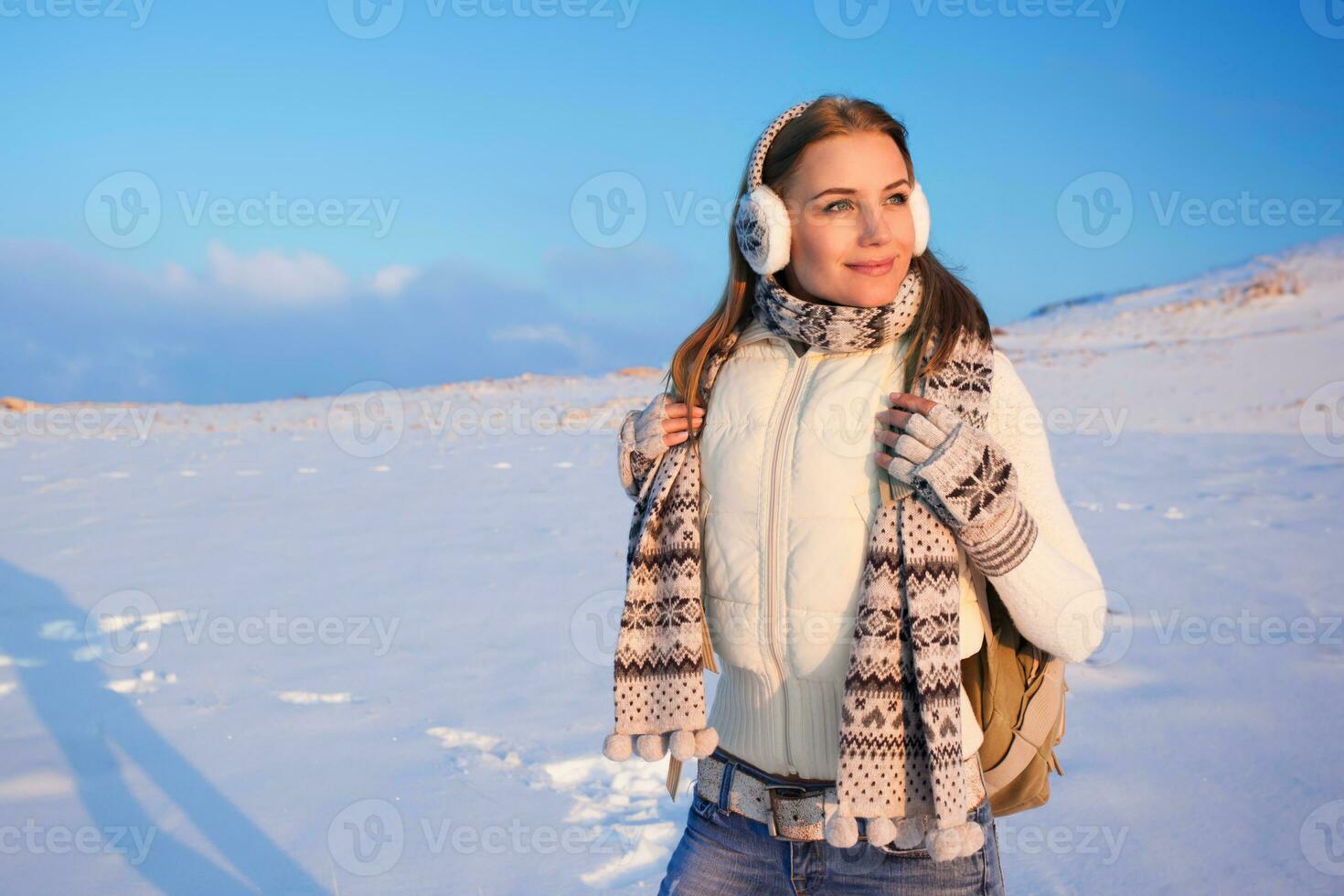 Happy female on winter holidays photo