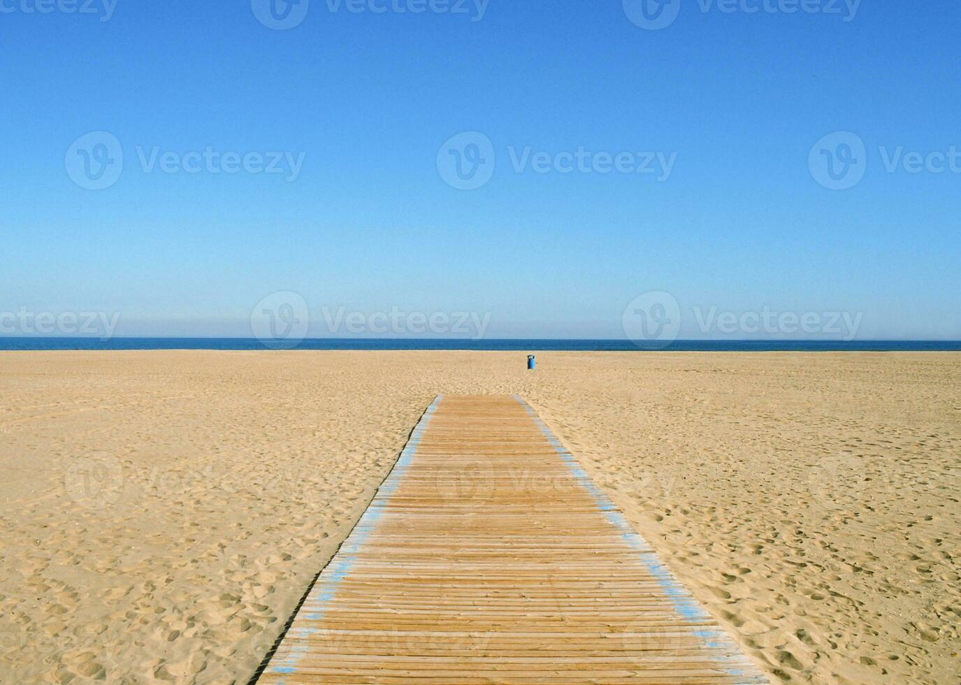 Sea and empty beach scene photo