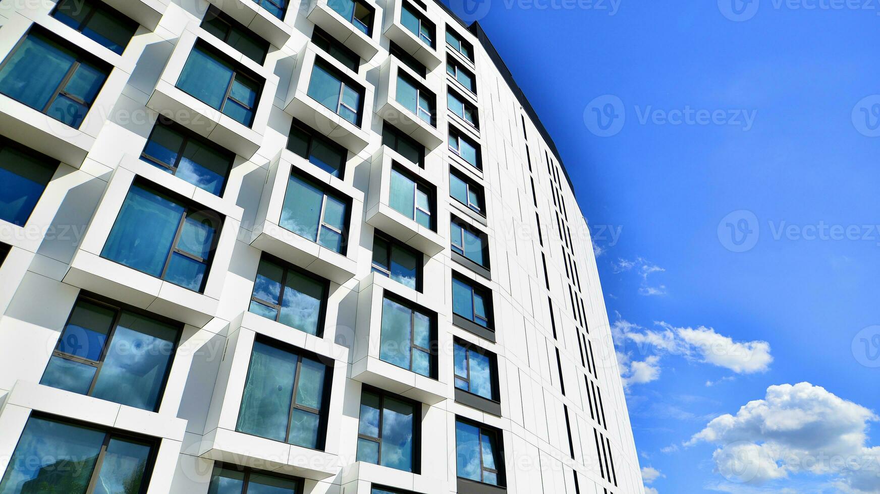 The facade of the new apartment building shaped like cubes. Minimalist  apartment building of a cube structure. photo