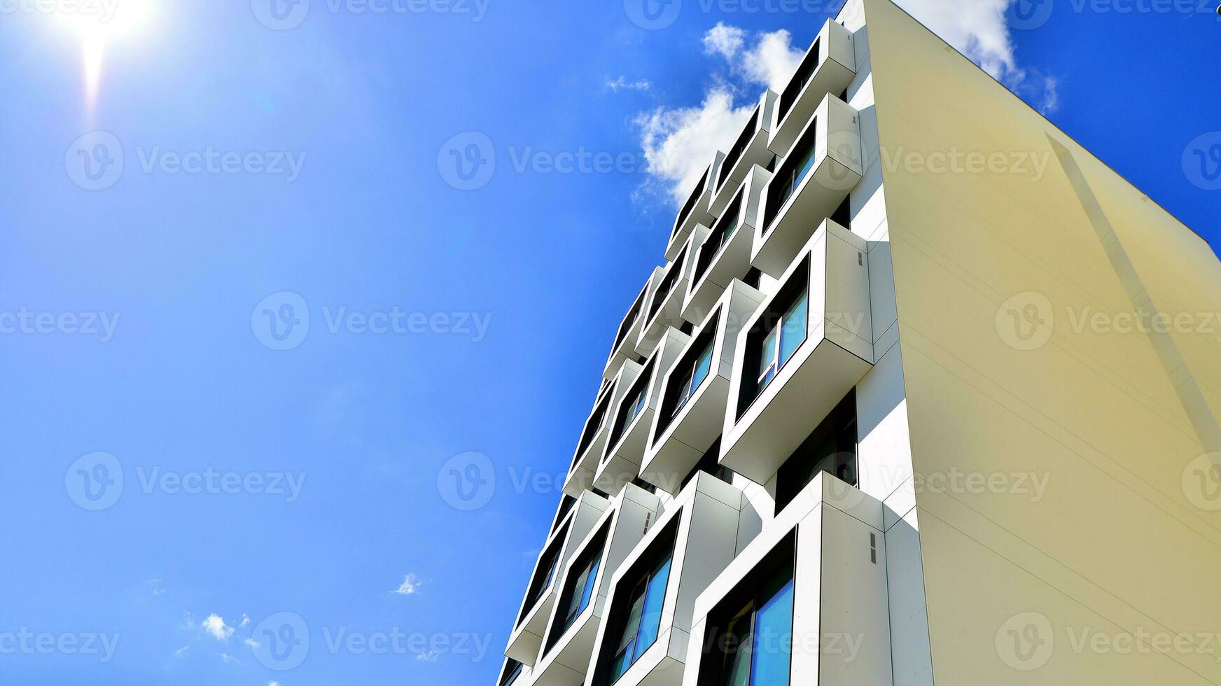 The facade of the new apartment building shaped like cubes. Minimalist  apartment building of a cube structure. photo