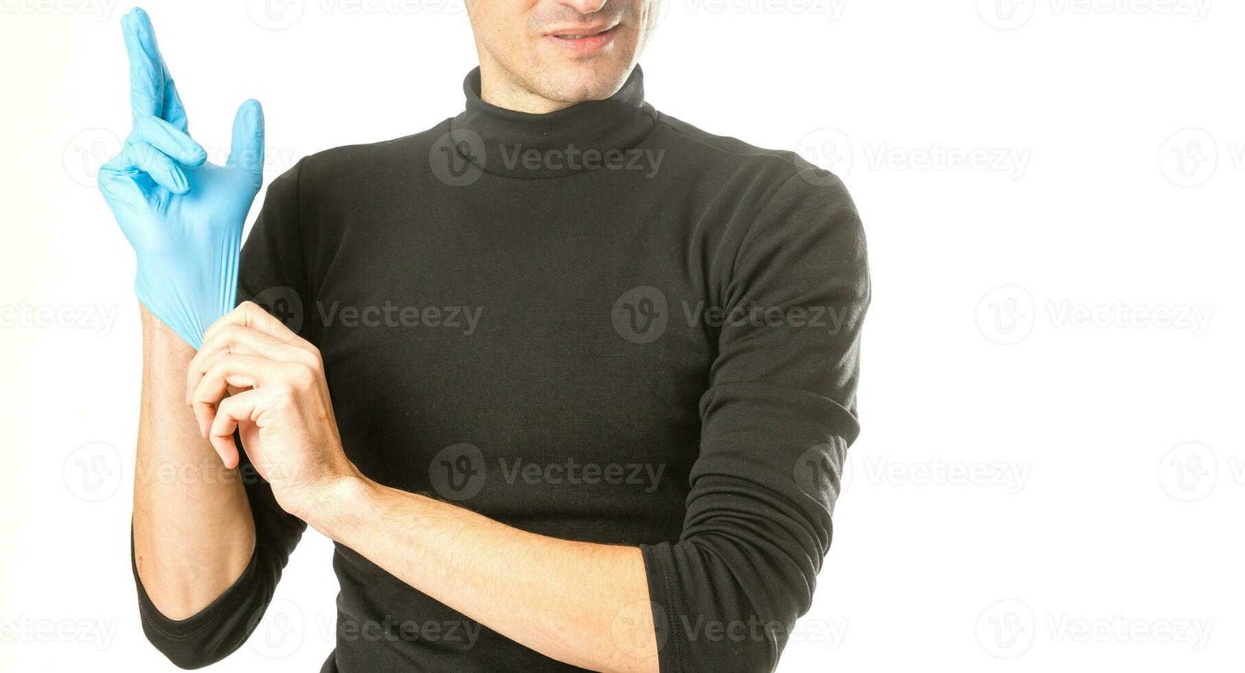 médico mano en estéril guantes aislado en blanco foto