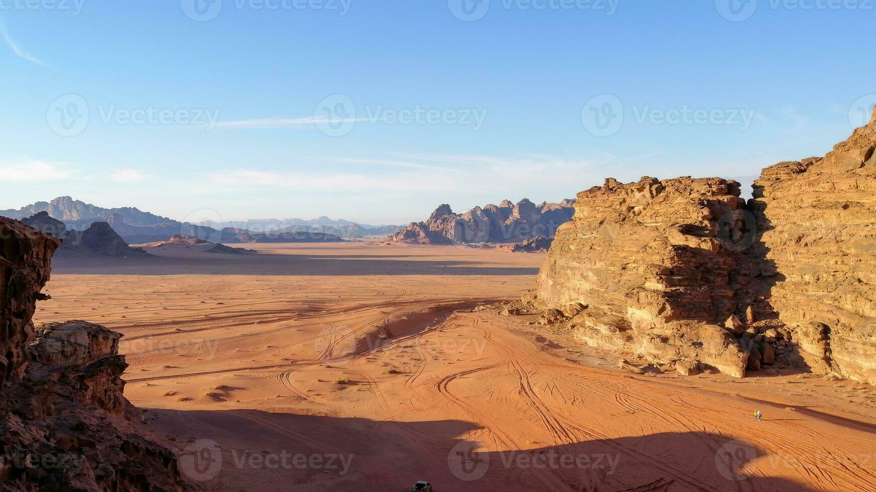 With camel caravan through the deserts of Wadi Rum, Jordan photo