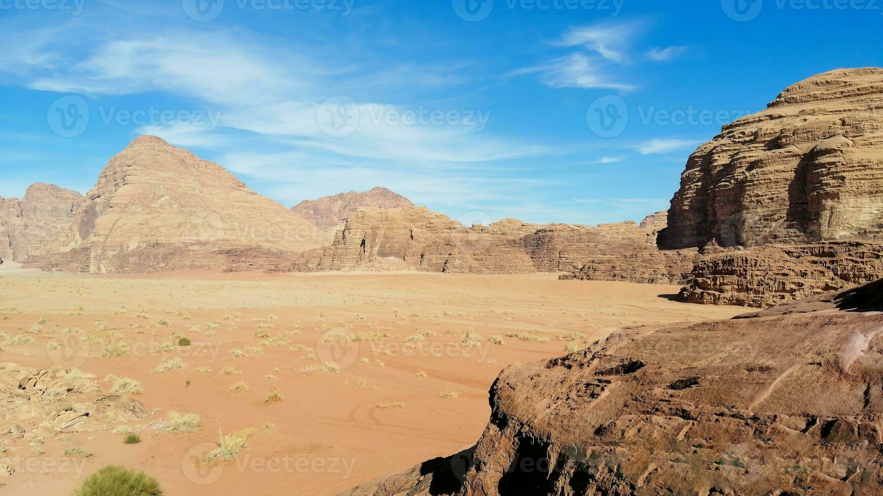With camel caravan through the deserts of Wadi Rum, Jordan photo