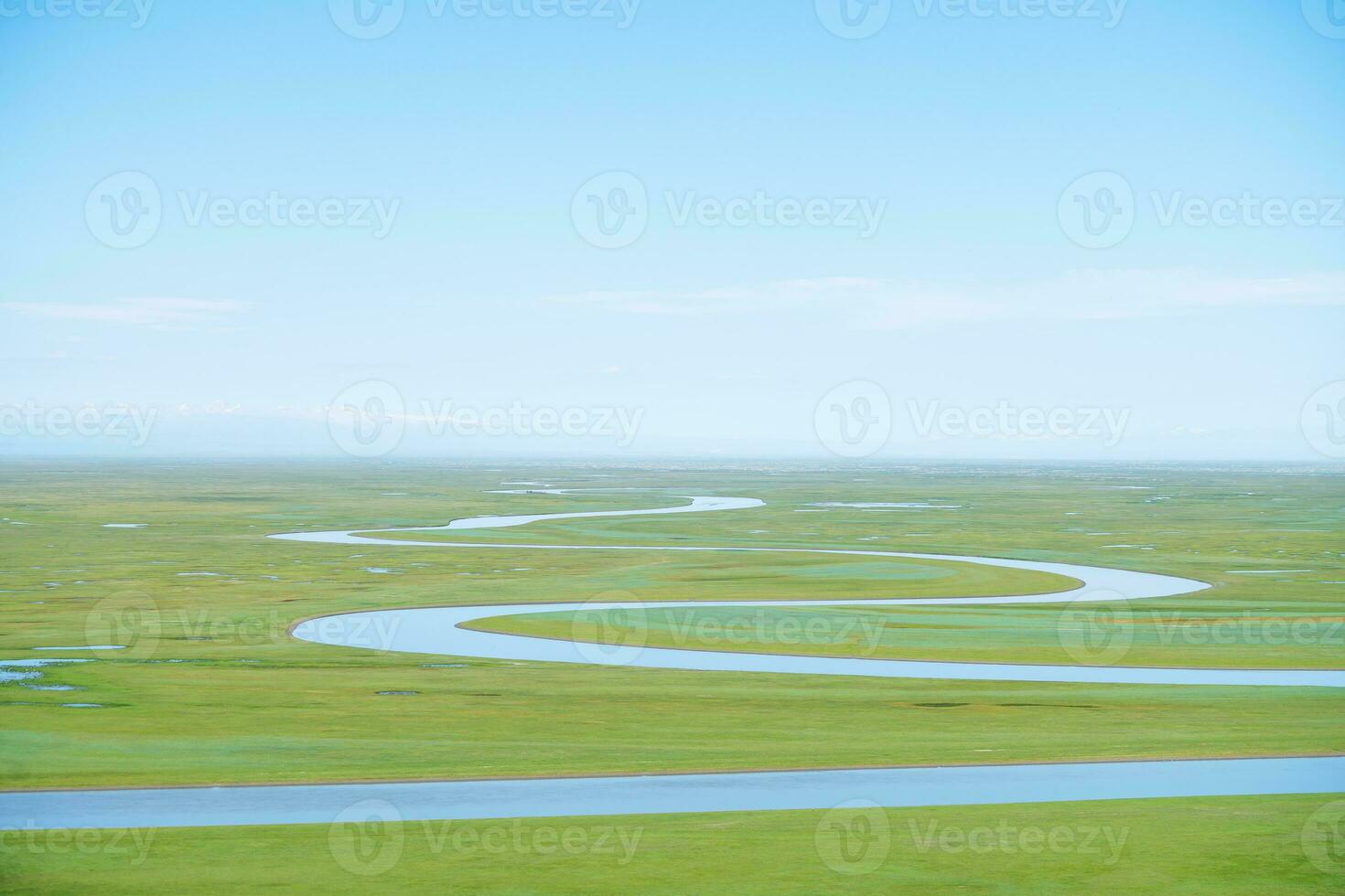 Winding rivers and meadows. Photo in Bayinbuluke Grassland in Xinjiang, China.