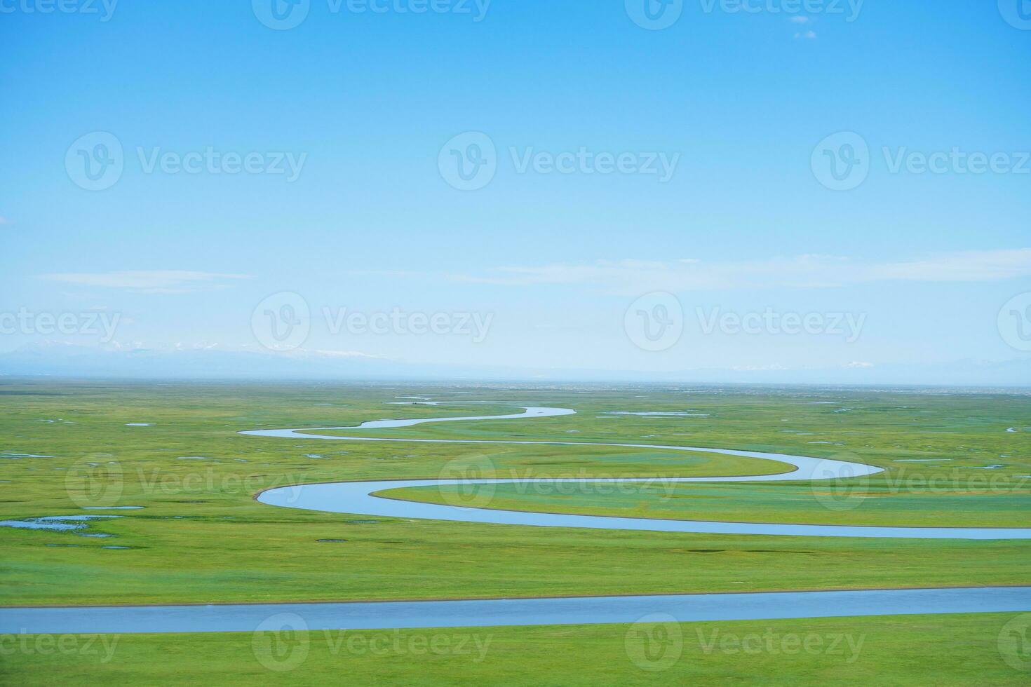 Winding rivers and meadows. Photo in Bayinbuluke Grassland in Xinjiang, China.