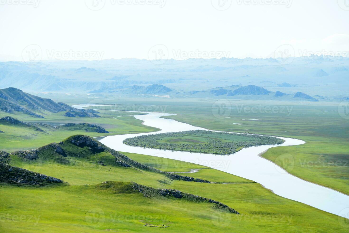 Winding rivers and meadows. Photo in Bayinbuluke Grassland in Xinjiang, China.
