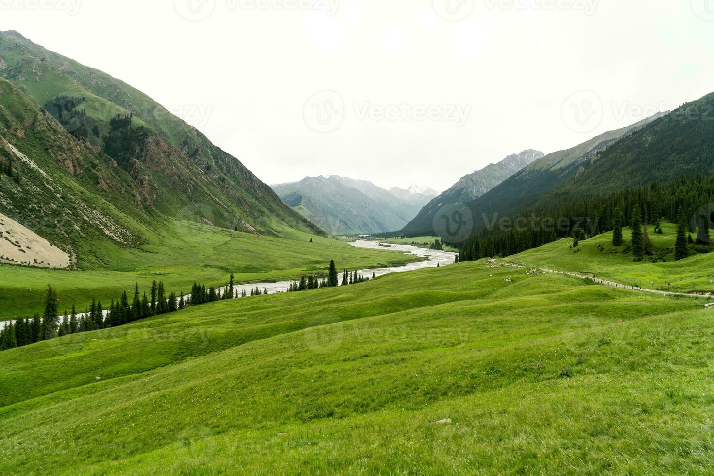 River and mountains with white clouds. photo