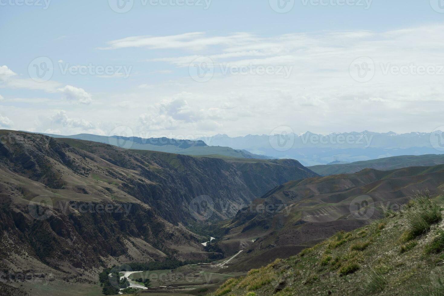 Grassland and mountains in a sunny day. photo