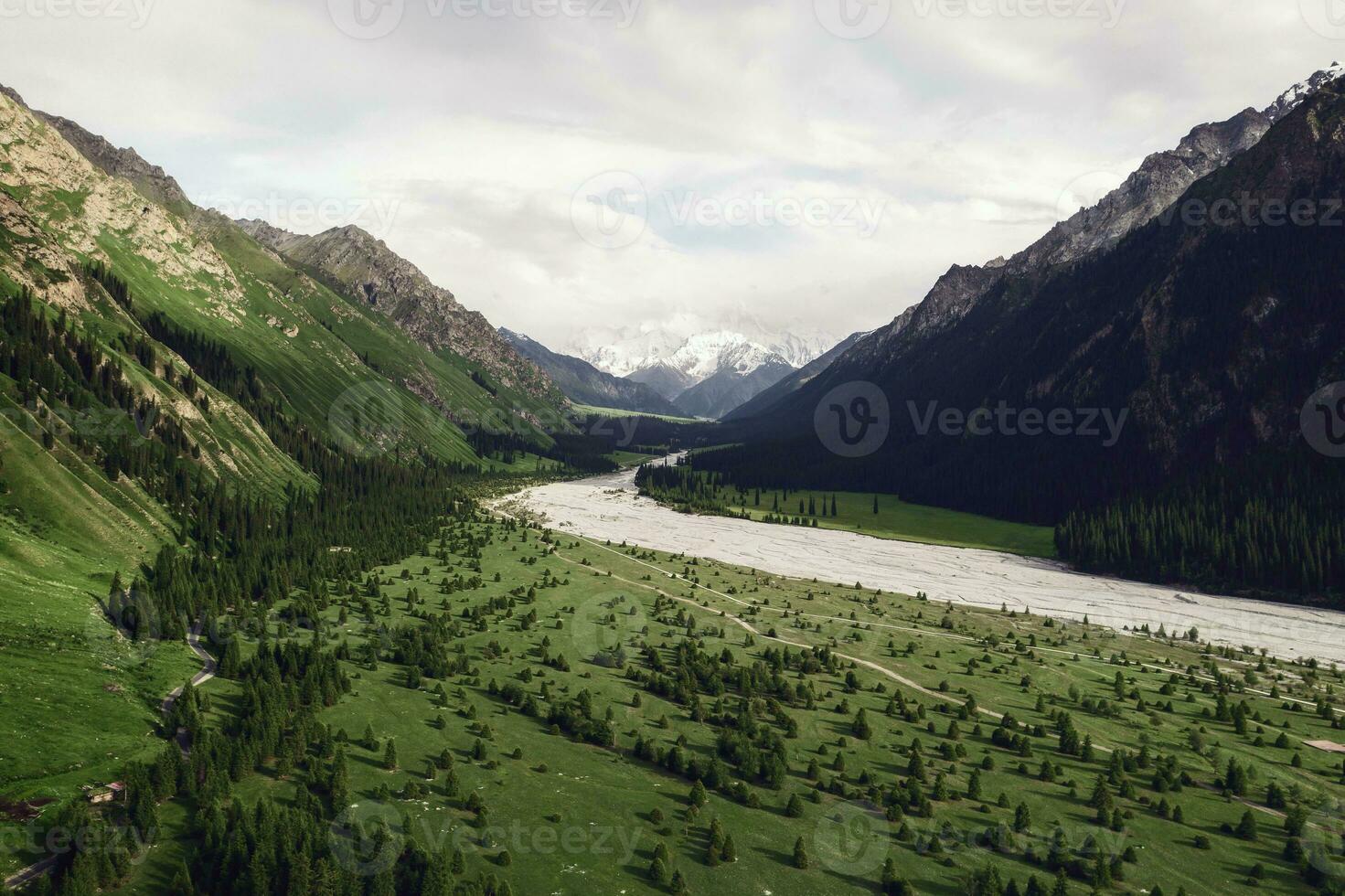 River and mountains with white clouds. photo