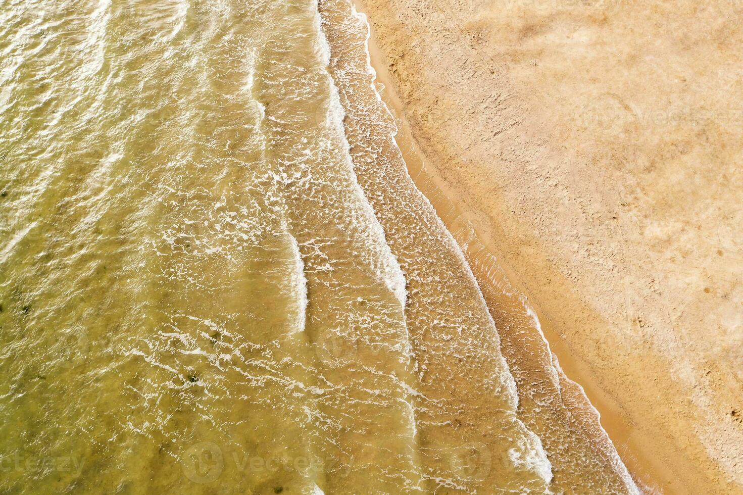 Landscape by the lake, soil and the lake edge. photo