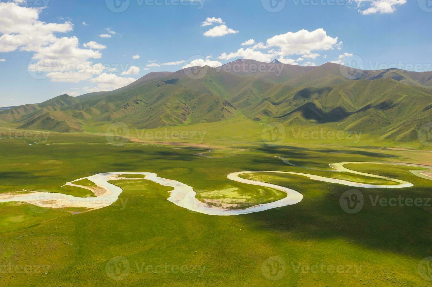 Winding rivers and meadows. Photo in Bayinbuluke Grassland in Xinjiang, China.