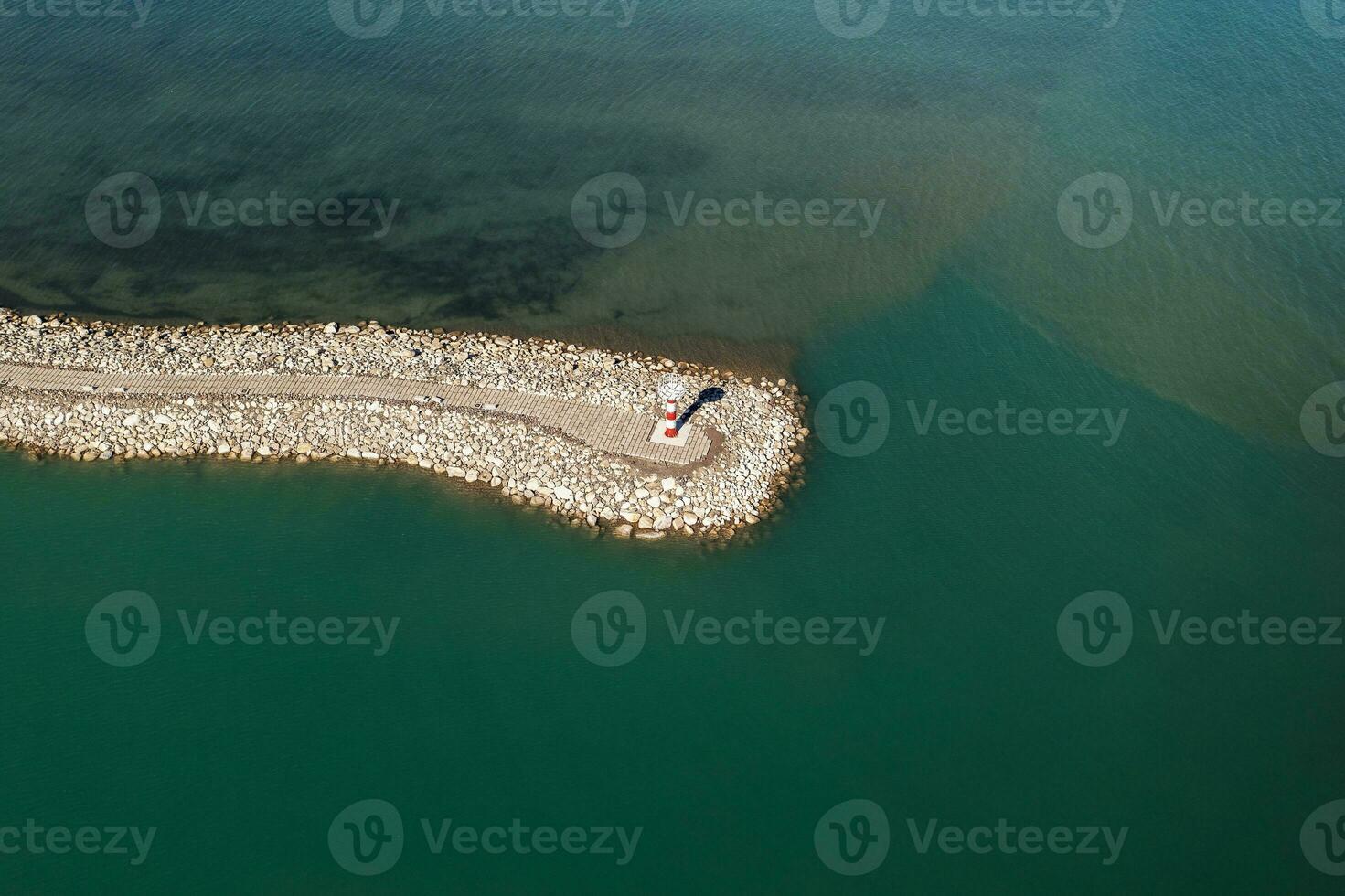 Road and lighthouses on the lake. Shot in Sayram Lake in Xinjiang, China. photo