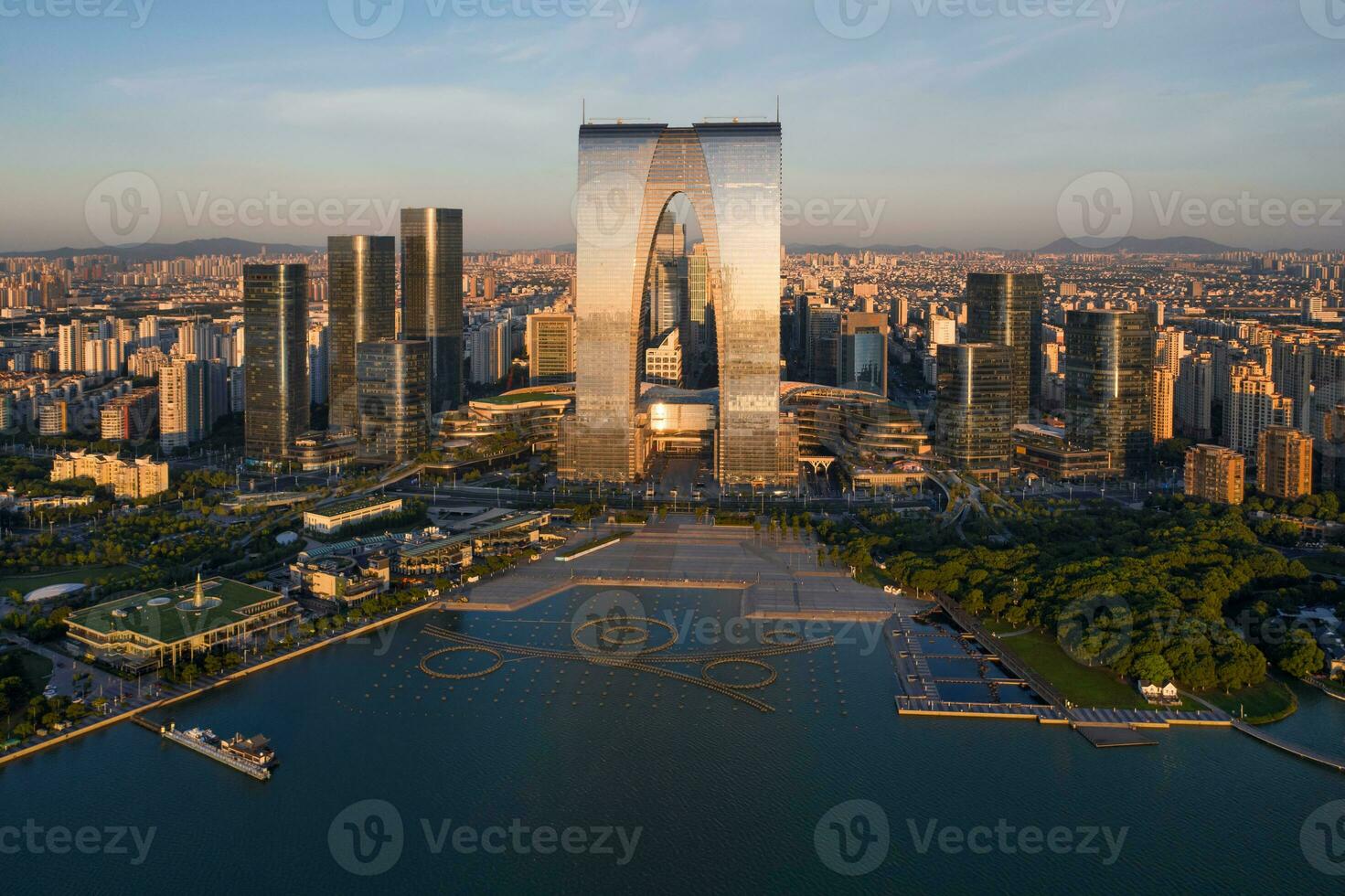 CBD buildings by the lake in Suzhou, China in the morning. photo