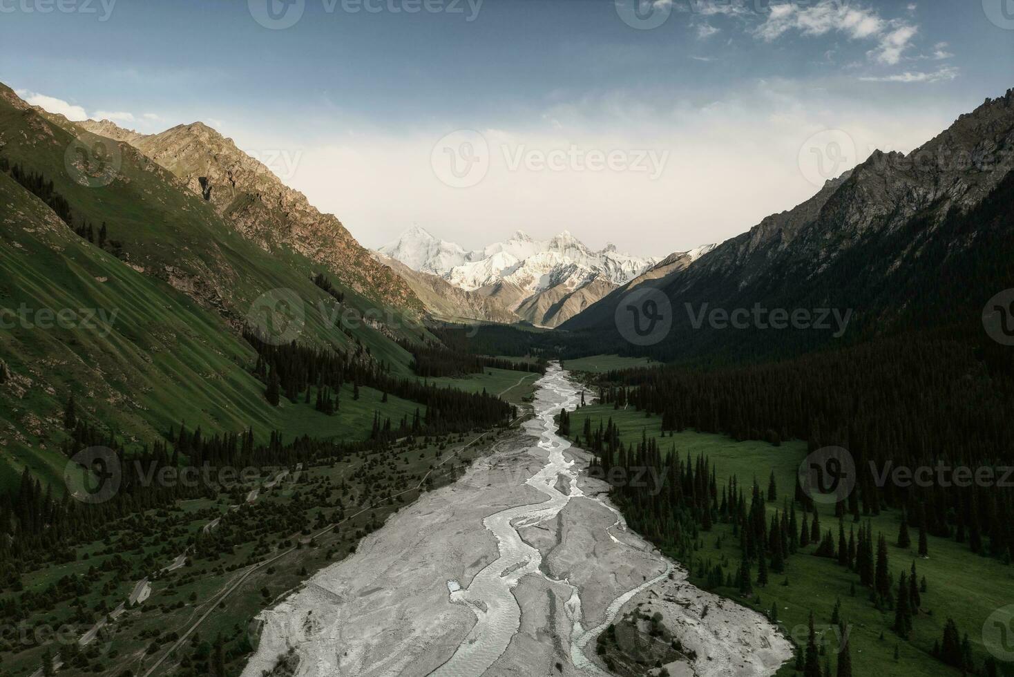 River and mountains with white clouds. photo