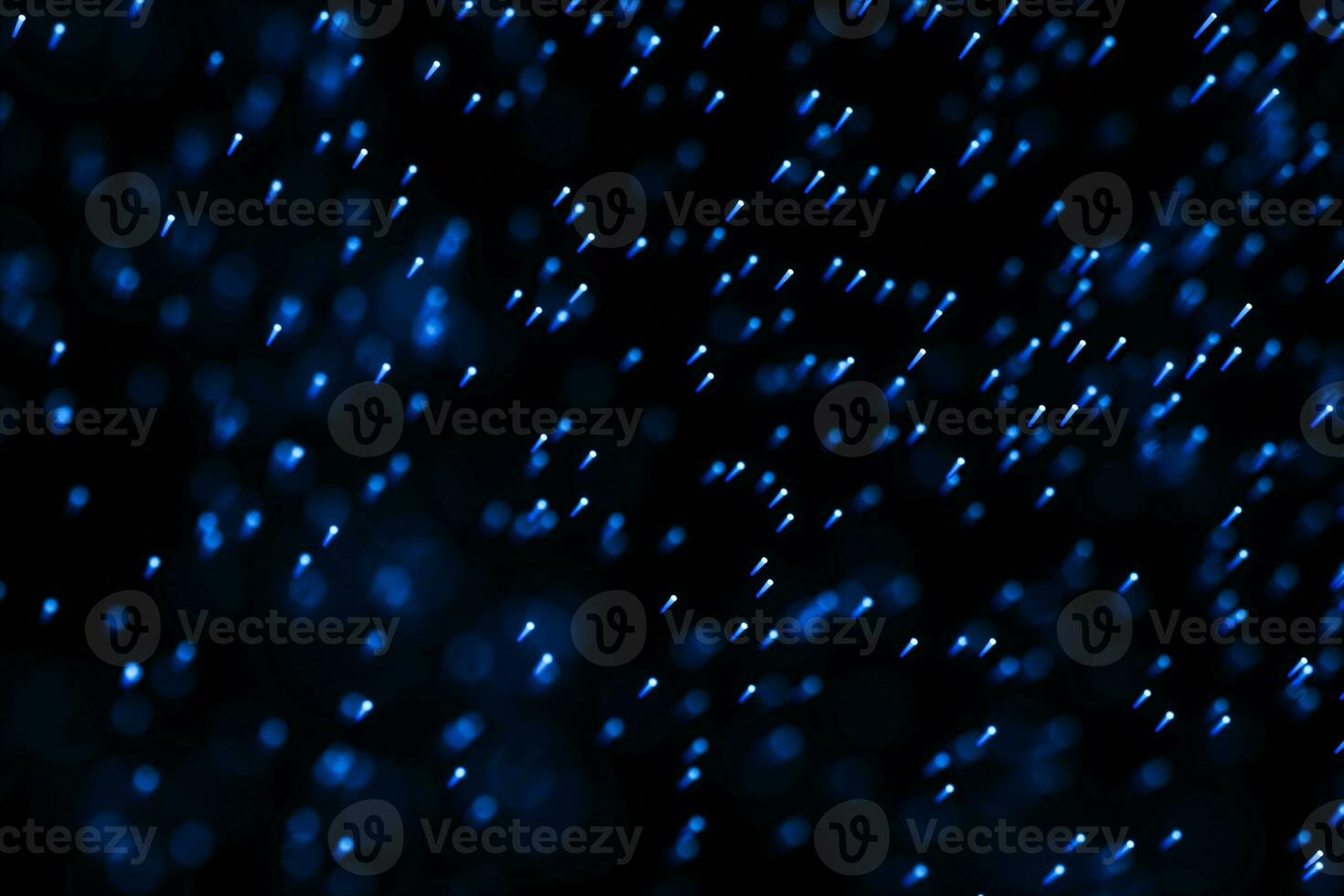 Flowing and glowing particles with dark background, 3d rendering photo