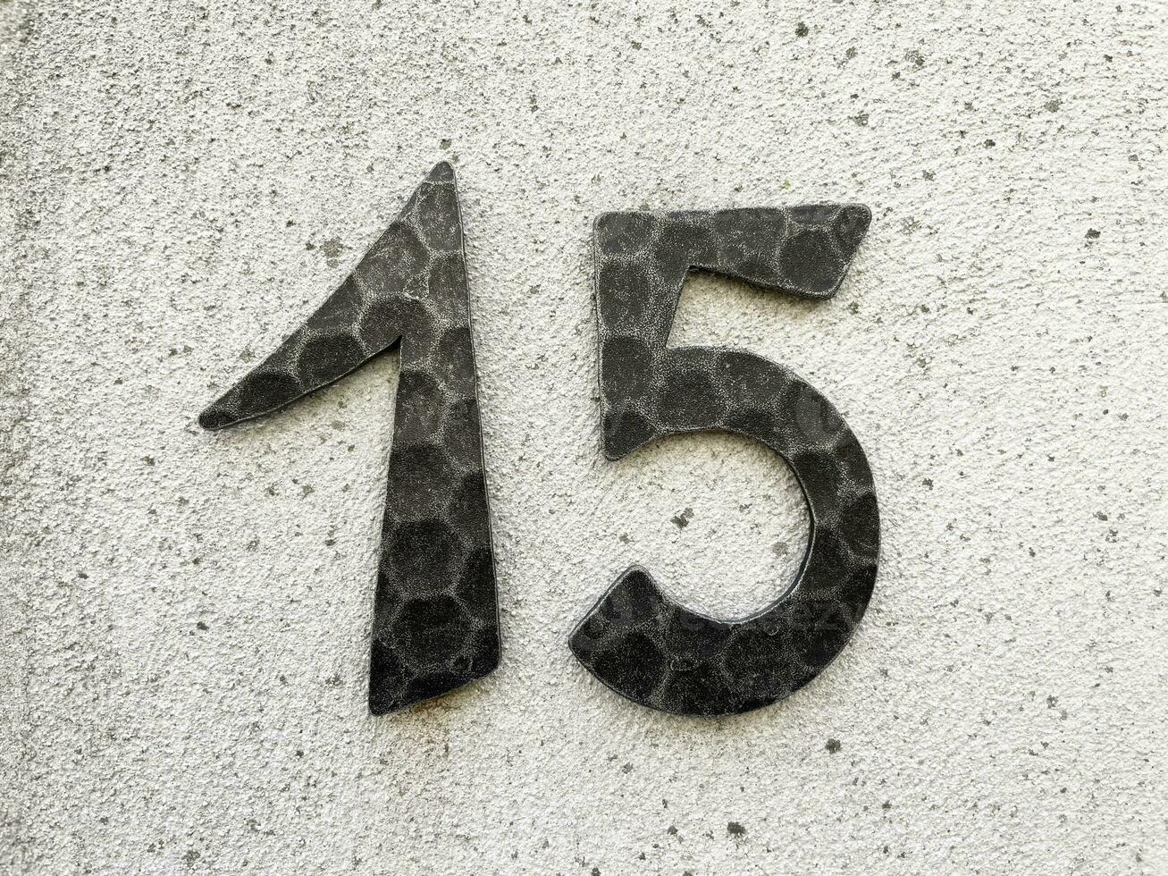 15 - house number fifteen on wall photo