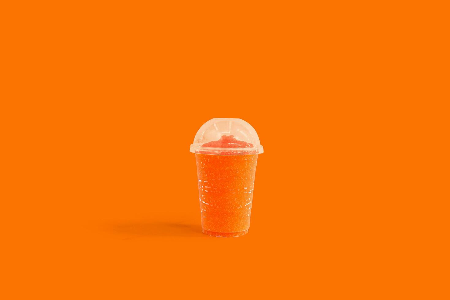 Fresh Fruit Punch smoothie in plastic cups take away on background, Fruit drink for healthy concept photo