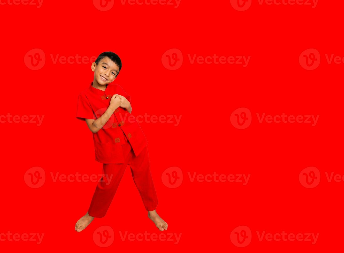 little boy fashion Smiling child in red chinese dress, style and fashion ideas for children. chinese new year photo