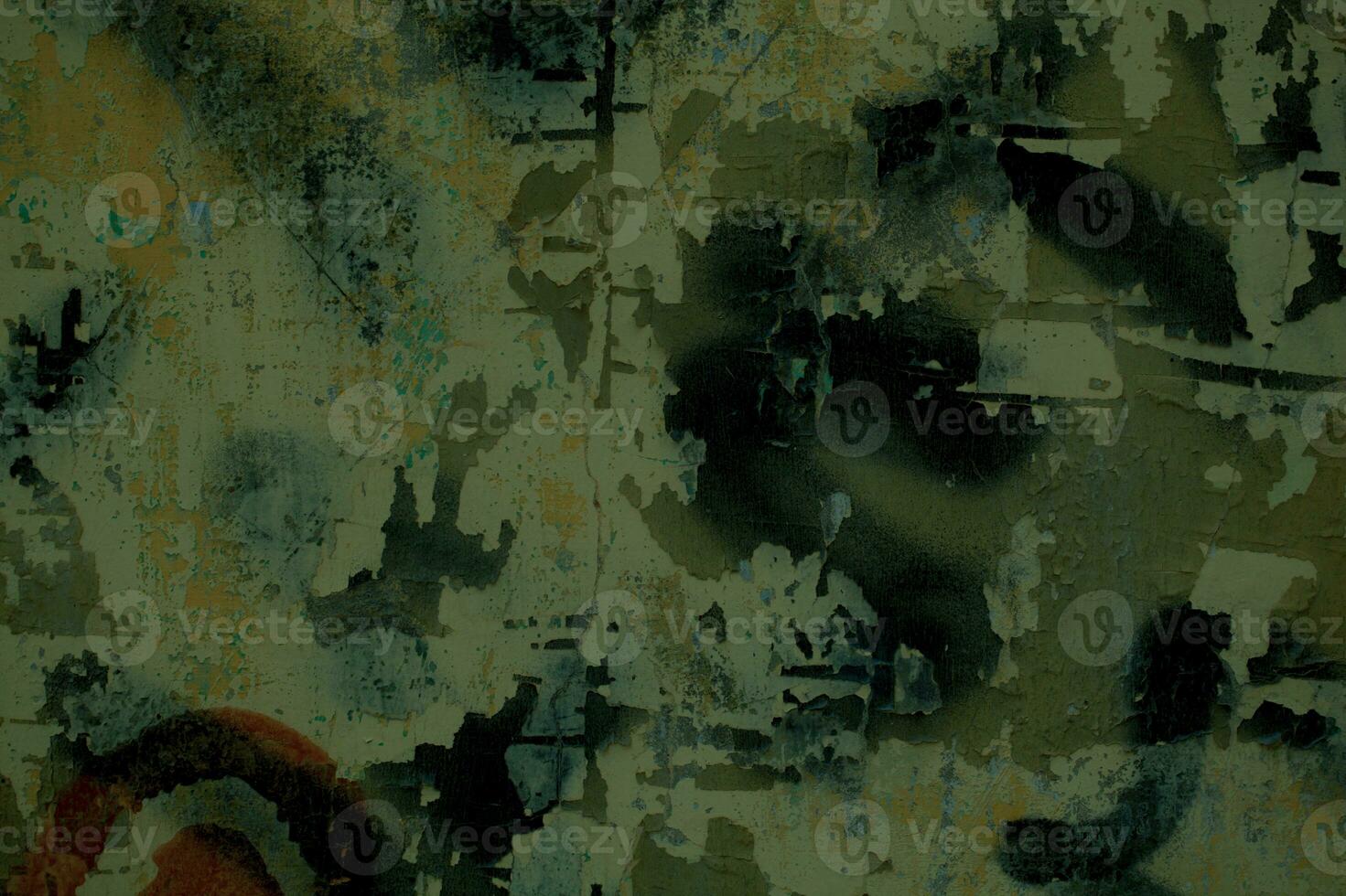 Grungy damaged graffiti on an old wall photo