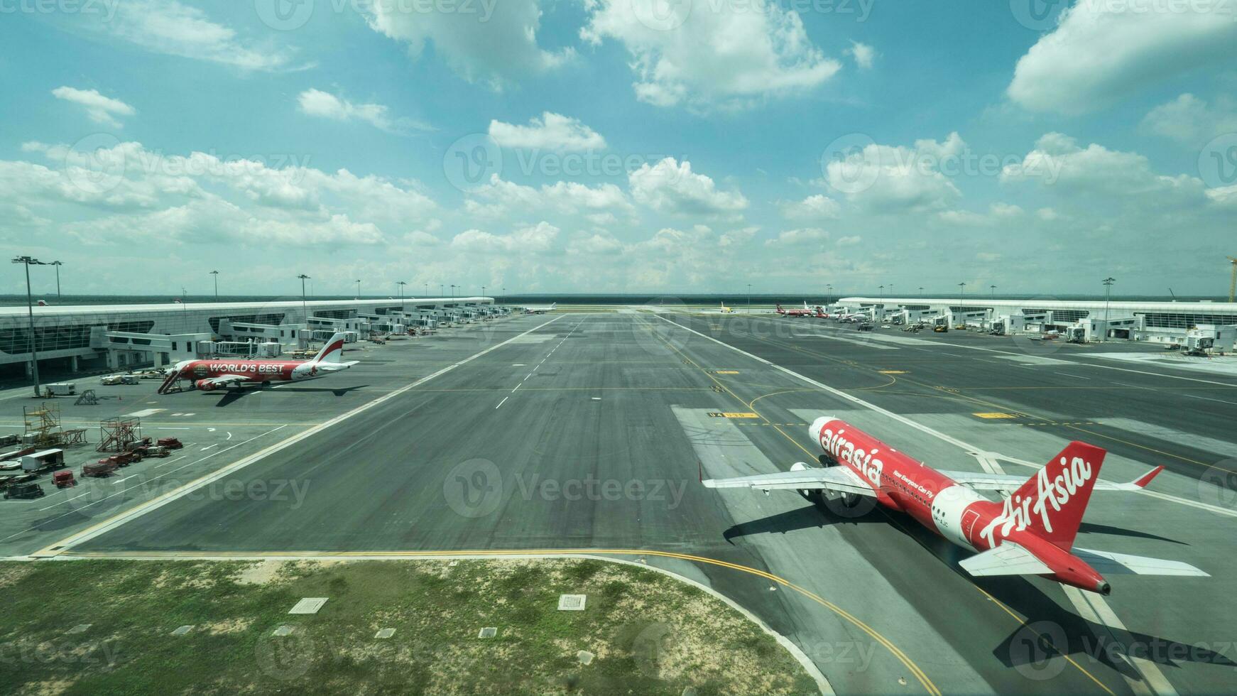 Planes on flying line in Kuala Lumpur airport photo